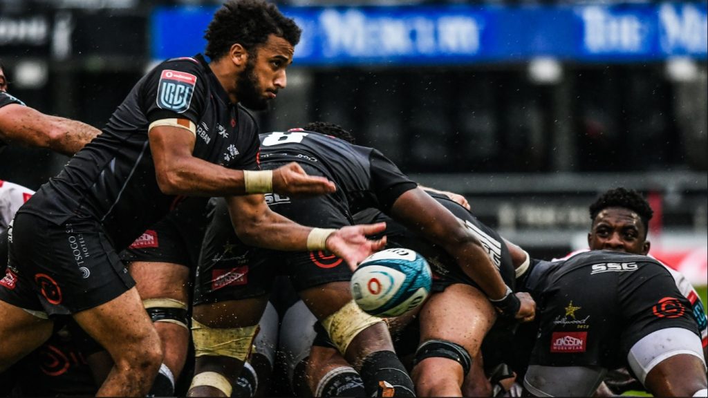 Sharks overpower Lions in the rain