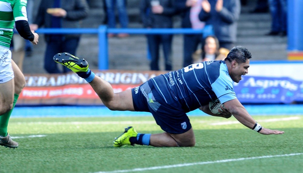 Blues in eight-try romp over Treviso