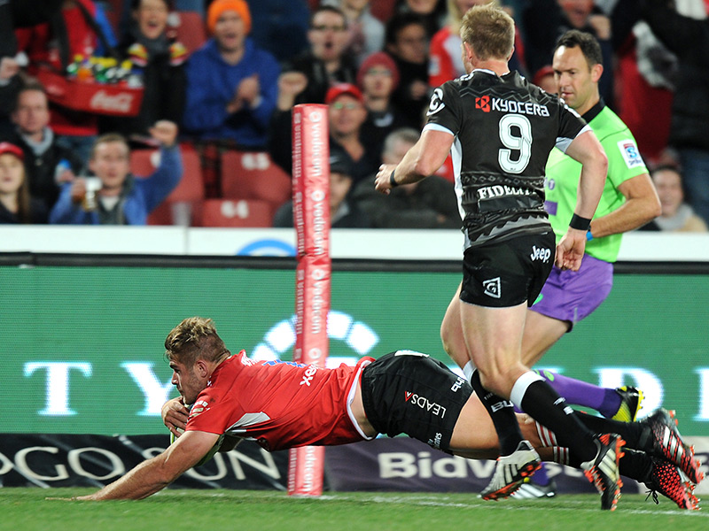 Lions go top after Sharks rout