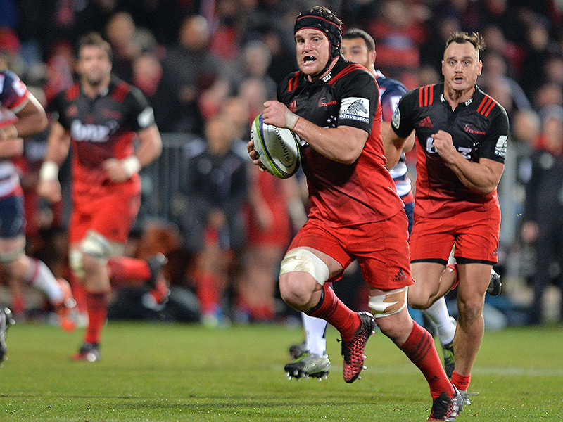 Crusaders race clear in 13-try rout